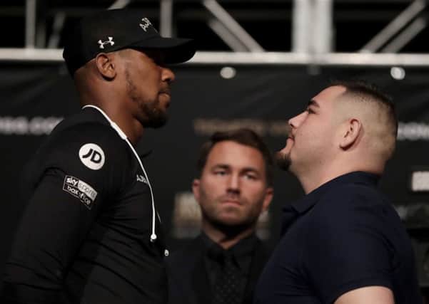 Anthony Joshua, left, faces off against Andy Ruiz Jr before a press conference ahead of their heavyweight showdown at Madison Square Garden. Picture: AP.