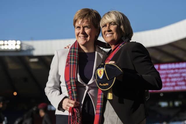 Scotland's First Minister Nicola Sturgeon and former Scotland player Rose Reilly. Picture: SNS Group
