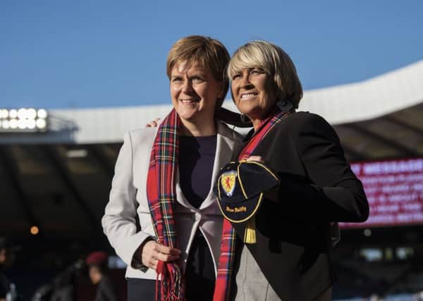 Scotland's First Minister Nicola Sturgeon and former Scotland player Rose Reilly. Picture: SNS Group