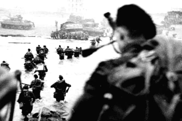 Troops storming the beachhead in 1944