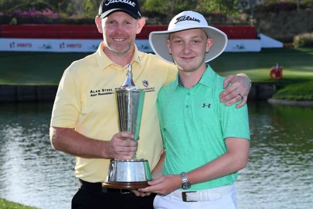 Stephen Gallacher, pictured with his son Jack after winning the Hero Indian Open, is playing in next week's GolfSixes. Picture: Getty Images