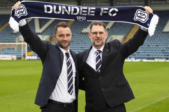 James McPake, left, is unveiled as Dundees new manager by managing director John Nelms at Dens Park yesterday. Picture: SNS.
