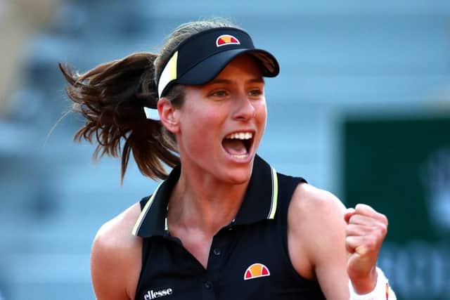 Johanna Konta celebrates as she completes her 6-2, 6-1 victory over Viktoria Kuzmova yesterday. Picture: Getty.