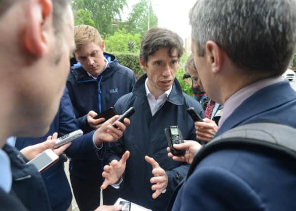 Rory Stewart is waylaid by reporters on his walkabout in Edinburgh. Picture: Jon Savage