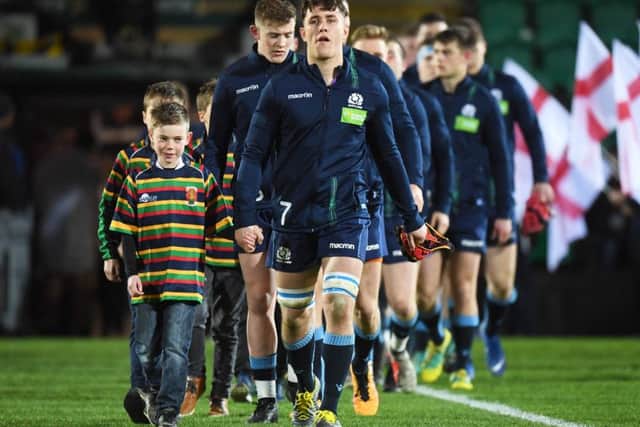 Scotland captain Connor Boyle leads his team out. Picture: SNS group