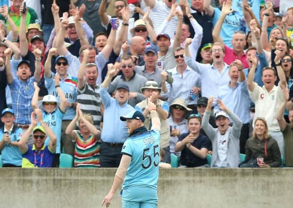 Spectators at The Oval rise to acclaim Ben Stokes after his stunning catch to dismiss South Africa's Andile Phehlukwayo. Picture Nigel French/PA