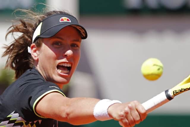 Johanna Konta stretches to play a backhand during her impressive fourth-round win against Donna Vekic. Picture: AP.