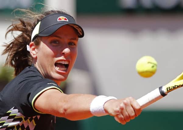 Johanna Konta stretches to play a backhand during her impressive fourth-round win against Donna Vekic. Picture: AP.