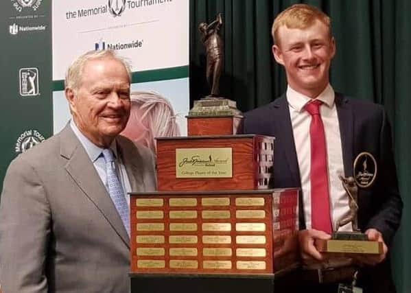 Callum Bruce  receives his award from Jack Nicklaus.
