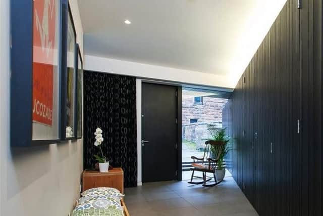 The entrance hall has plenty of storage space.