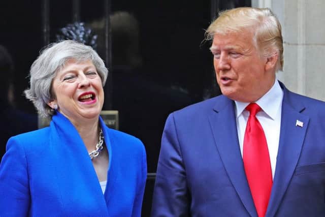 Prime Minister Theresa May welcoming US President Donald Trump to Downing Street. Picture: Aaron Chown/PA Wire