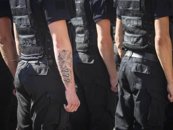 Some tattoos are not acceptable for police officers in Scotland