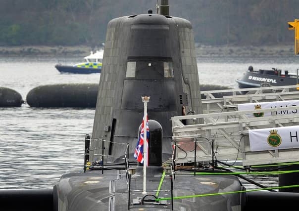 An astute-class submarine HMS Artful is pictured after officially becoming a commissioned warship of the Royal Navy at a ceremony at Faslane Naval Base. Picture: Andy Buchanan/Getty Images