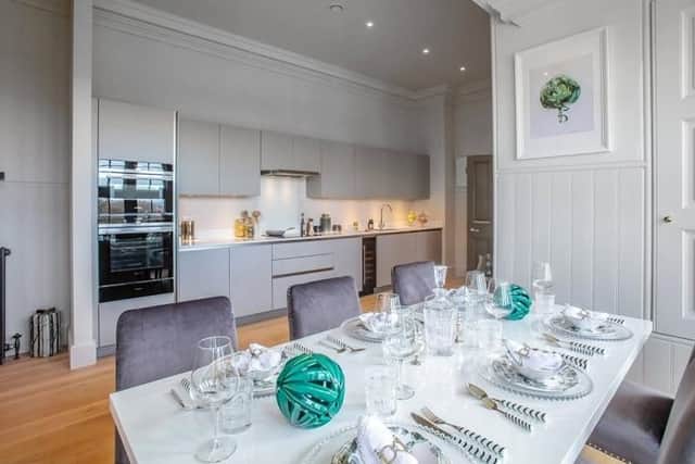 New owners can entertain friends and family in the kitchen dining area.