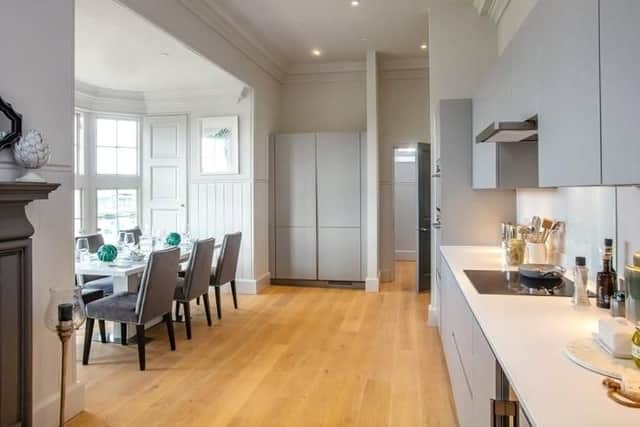 The kitchen features featuring Corian worktops.