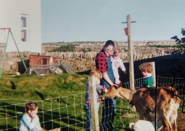 Maggie with children and goats at Stromness. Picture: Contributed