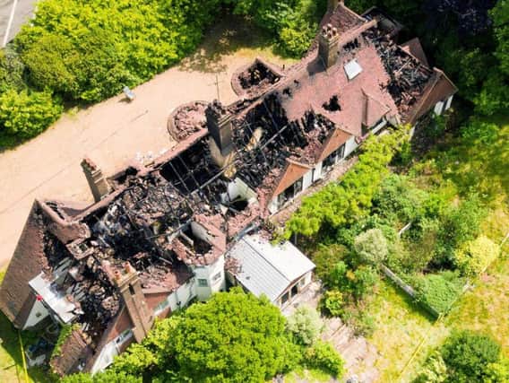 An aerial view of the burnt out ruins of the former home of JLS star Oritse Williams.