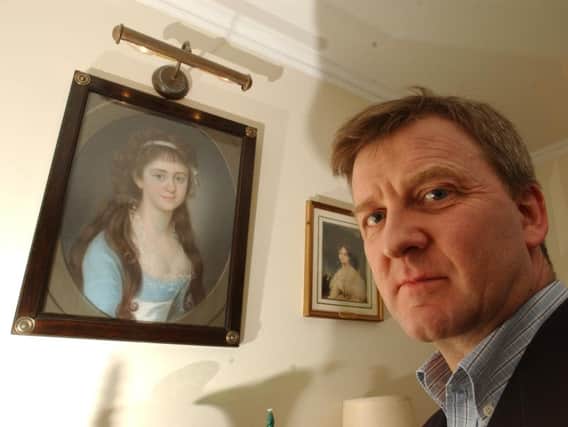 Peter Pininski pictured in 2002 with a painting of Marie-Victoire, Princess de Rohan, Bonnie Prince Charlie's granddaughter. Picture: Phil Wilkinson/TSPL