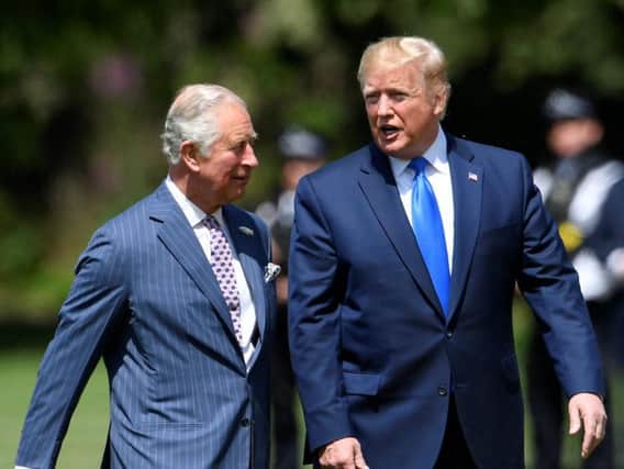 Prince Charles (left) listening to Donald Trump during the US president's UK state visit