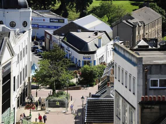 The east end of Falkirk High Street, with Callendar Square shopping centre on the left .