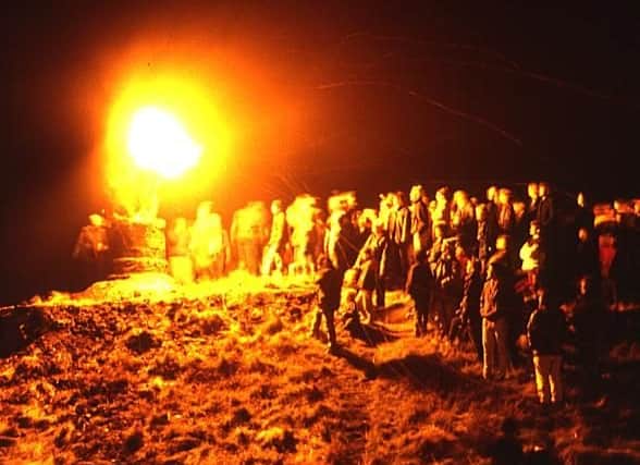 The Burning of the Clavie involves a hooped barrel, the Clavie, which is filled with old bits of tar and wood. 10 men take turns to carry the burning Clavie round the streets, stopping off to present bits of embers to houses.