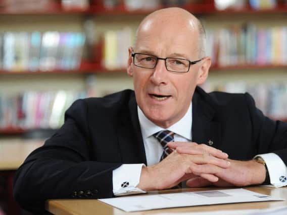 John Swinney was compared with Donald Trump