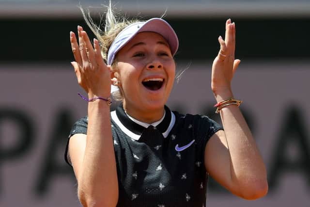 Amanda Anisimova celebrates after her win over Simona Halep. Picture: Christophe Archambault/AFP/Getty