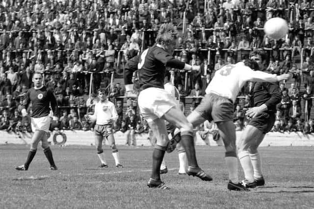 Colin Stein heads home one of his four goals in the 8-0 victory over Cyprus in 1969. Picture: TSPL.