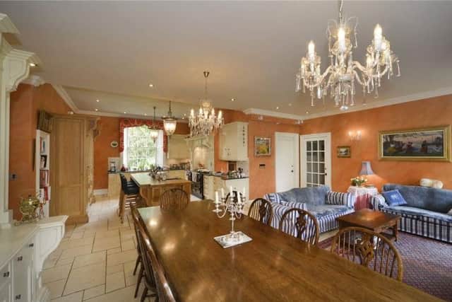 The open plan dining area and kitchen are ideal for family dinners.