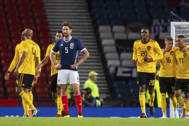 Charlie Mulgrew looks dejected as Scotland go down 4-0 to Belgium at Hmapden. Picture: SNS Group
