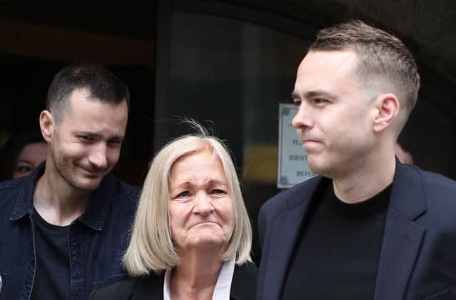 Sally Challen, flanked by her sons James (left) and David (right),  leaves the Old Bailey after hearing she will not face a retrial over the death of her husband Richard Challen in 2010. PRESS ASSOCIATION