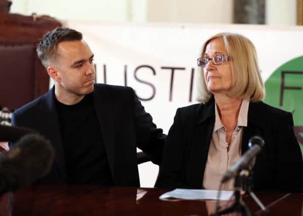 Sally Challen with her son David during a press conference after she left the Old Bailey where she was told that she would not face a retrial over the death of her husband Richard Challen in 2010. Photograph: Yui Mok/PA Wire
