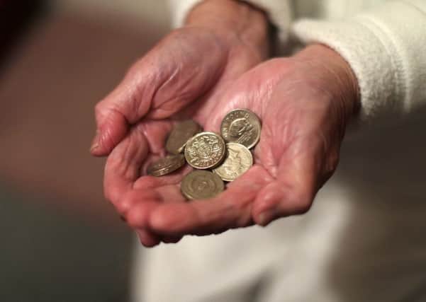 Long-running scams such as unsolicited doorstep selling and cold calling are continuing to cost victims an average of almost £3,000, Citizens Advice has warned. Picture: Yui Mok/PA Wire