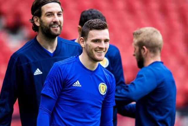 Scotland captain Andy Robertson,  training at Hampden, rapidly switched his focus after winning the Champions League with Liverpool. Picture: SNS.