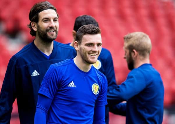 Scotland captain Andy Robertson,  training at Hampden, rapidly switched his focus after winning the Champions League with Liverpool. Picture: SNS.