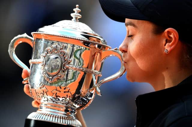 Ashleigh Barty kisses the trophy as she celebrates victory over Marketa Vondrousova at Roland Garros. Picture: Getty Images
