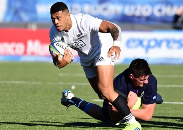 Etene Nanai Seturo of New Zealand is tackled by Will Hurd of Scotland. Picture: Getty Images