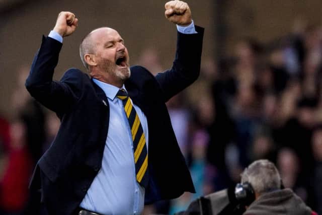 Steve Clarke celebrates Oli Burke's winner. Picture: SNS Group