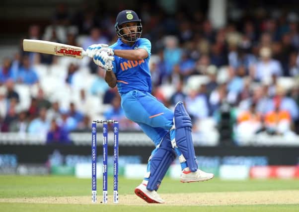 Shikhar Dhawan hooks during his innings of 117 as India beat Australia in London yesterday. Picture: PA.