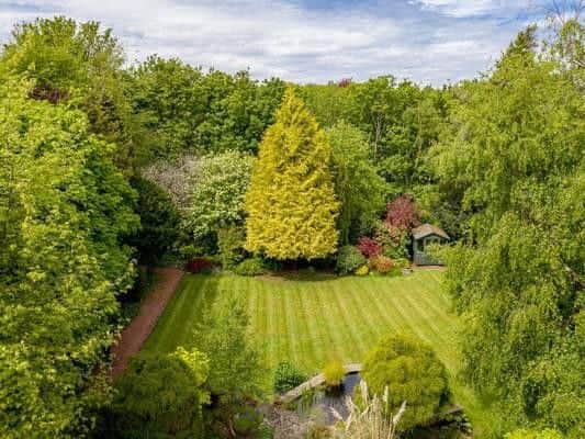 The house was originally built by Lord Sir Ian Hutchinson who was an advisor to Winston Churchill. There's even an upright concrete Anderson shelter still standing in the gardens from his time in the house.