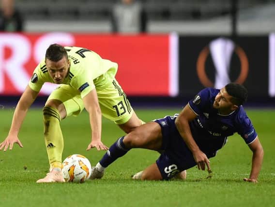 Dinamo's Amir Rrahmani attempts to shake off Anderlecht midfielder Zakaria Bakkali during a Europa League clash