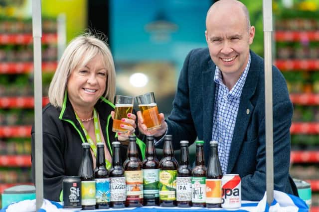 Asda regional trading assistant Yvonne McArthur with Craig Brown, retail sales director at the Craft Beer Clan of Scotland. Picture: Ian Georgeson