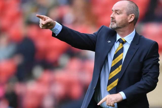 Scotland manager Steve Clarke issues instructions against Cyprus.