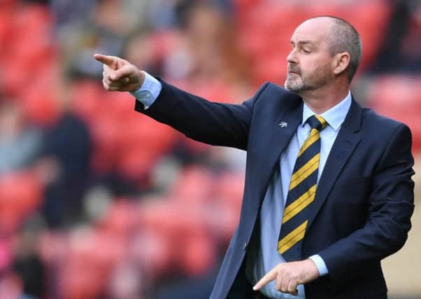Scotland manager Steve Clarke issues instructions against Cyprus.