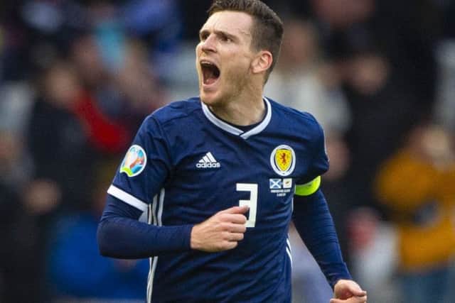 Andy Robertson celebrates opening the scoring for Scotland against Cyprus.