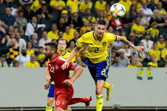 Mikael Lustig was speaking while on international duty with Sweden. Picture: AFP/Getty Images