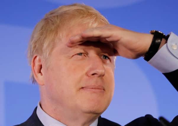 Boris Johnson listens to questions during his Conservative Party leadership campaign launch. Picture: Tolga Akmen/Getty