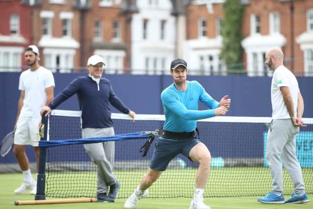 Andy Murray takes the strain during a practice session at Queen's Club 
as he steps up his comeback from hip surgery. Picture: Alex Morton/Getty Images for LTA