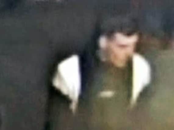 Police are hunting this man shown on CCTV in connection to a firework thrown at a Celtic Europa League match