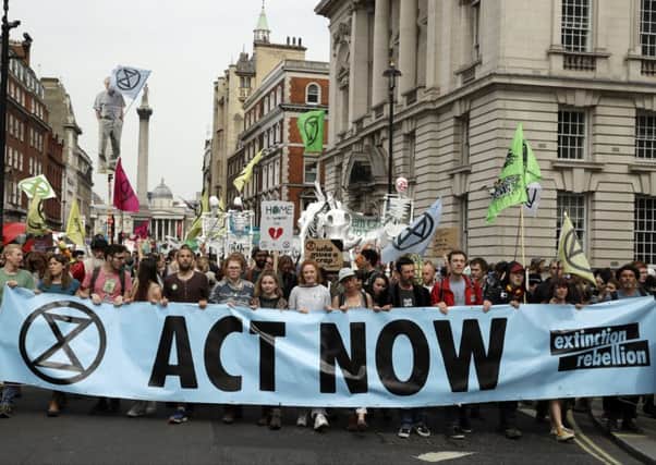 Calls for more action to tackle climate change have been growing (Picture: Matt Dunham/AP)